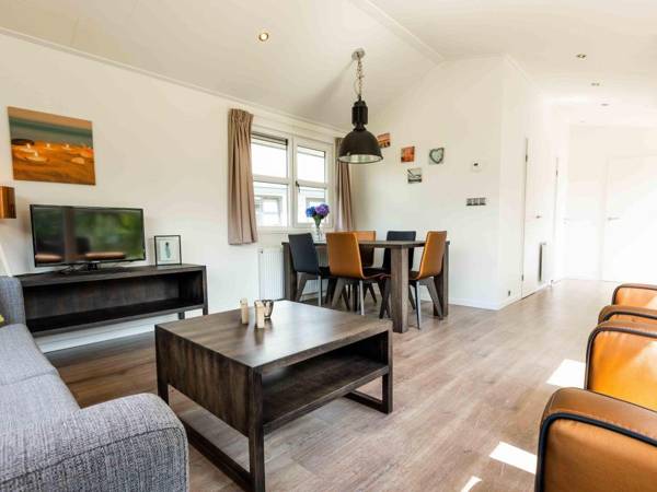 Modern chalet with combi-microwave in a water-rich area