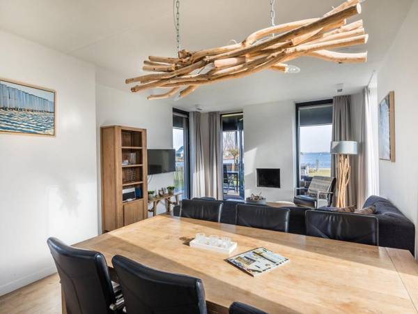 Modern design lodge directly at the water in national park