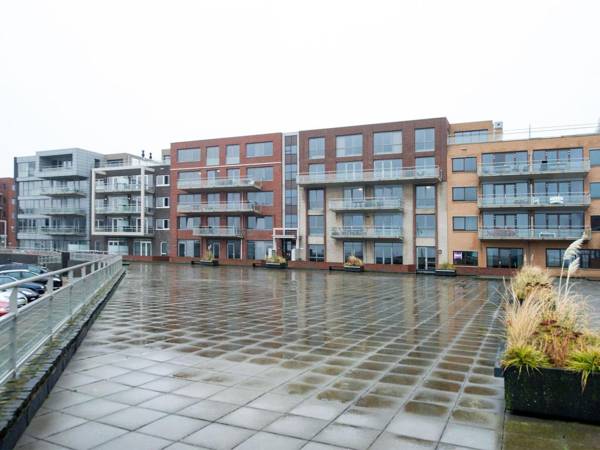 Modern apartment with a view of the Scheveningen harbor