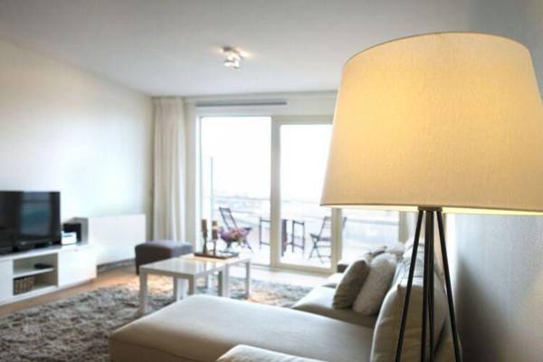 Modern apartment balcony with a view of the Dutch Olympic Sailing Association