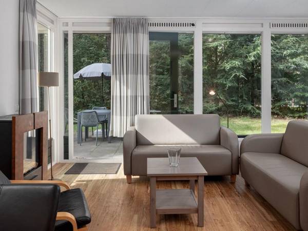 Engaging chalet with dishwasher next to a nature reserve