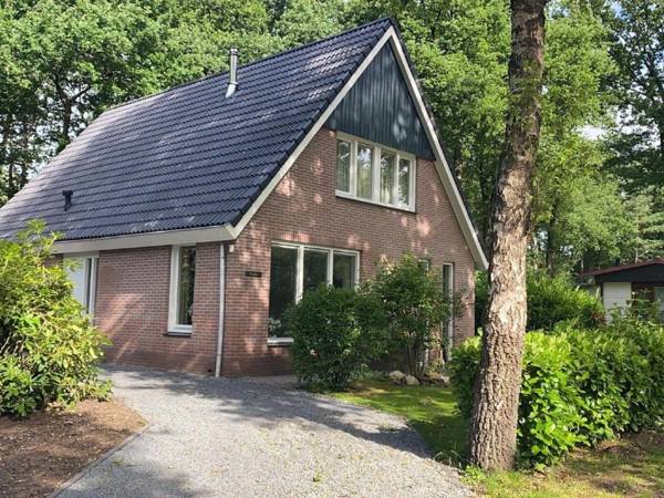 Comfortable home with fireplace located in nature