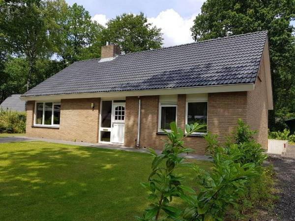 Nice holiday home with fireplace located in nature
