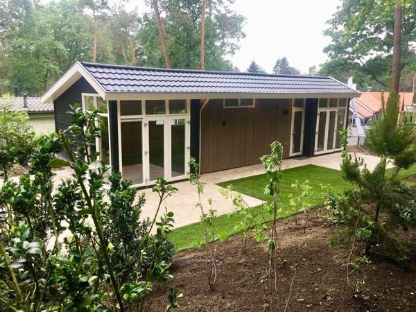 Modern chalet with a dishwasher located in nature