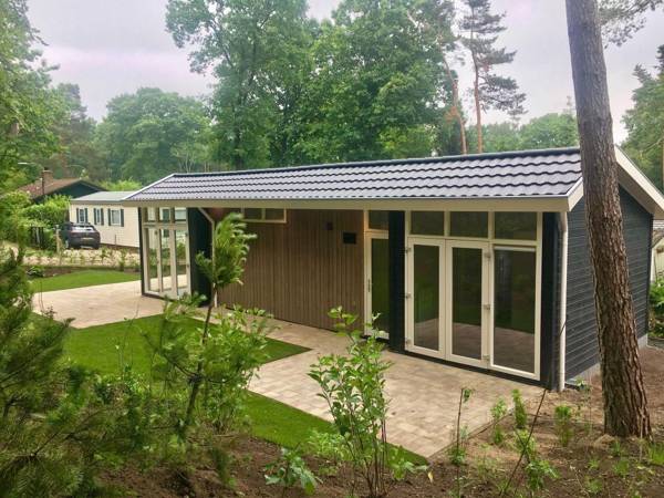Modern chalet with a dishwasher located in nature