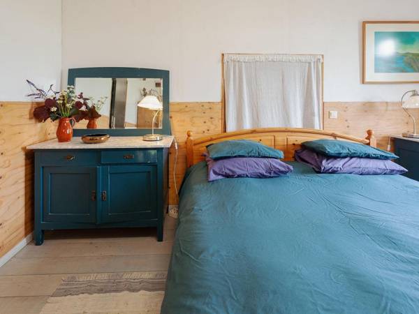 Characteristic headlong hull farm with thatched cover