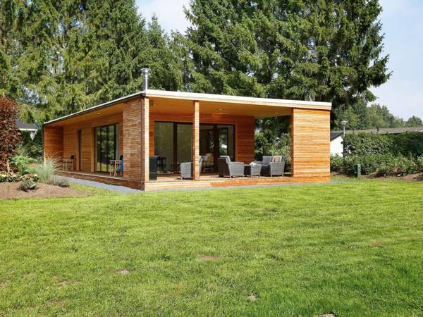 Modern lodge with a wood burning stove near Almelo