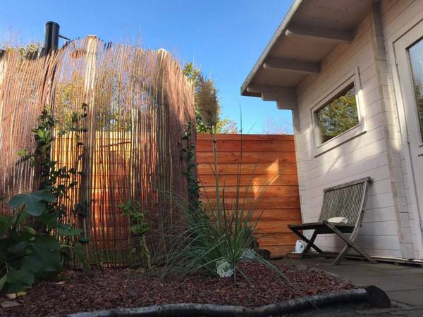 Relax in your holiday home with sauna 1 km from the beach of Noordwijk.