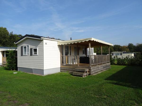 Comfortable chalet with veranda near the Loonse and Drunense Duinen