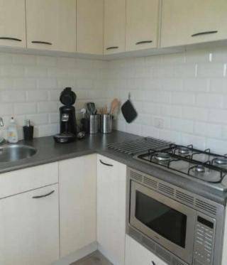 4 pers Mia Holiday home with lake view in front of the Lauwersmeer