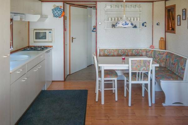 8 pers House 'Capitein Theis' with seaside in front of the Lauwersmeer