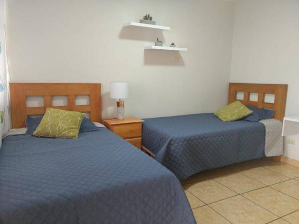 Habitación Alborada 2 con baño privado