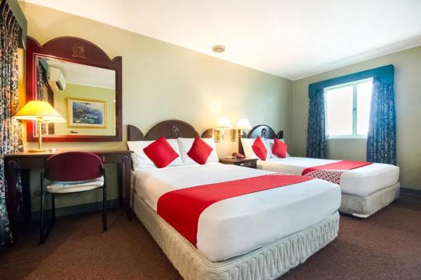 OYO 227 Palladium Suites Hotel