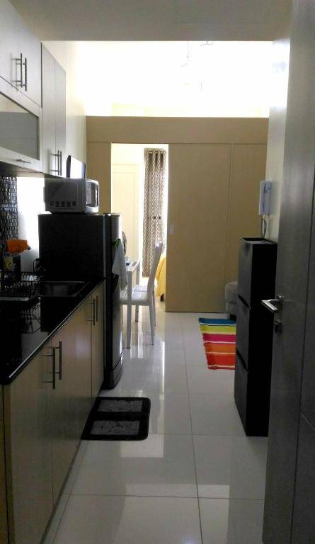 Cozy Condo at Wind Residences