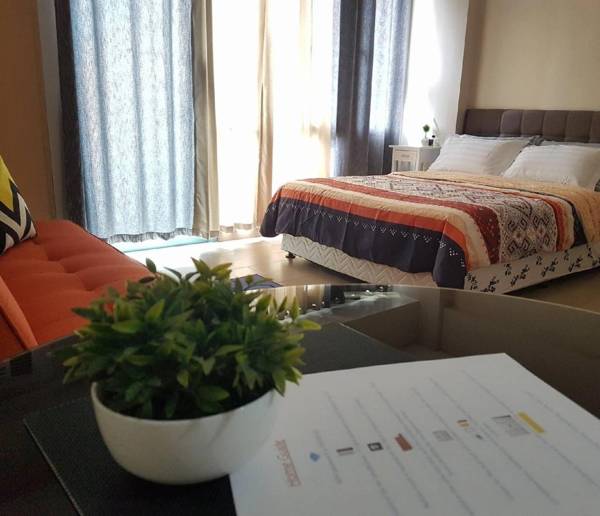 Airport Condo at Two Palm Tree Villas