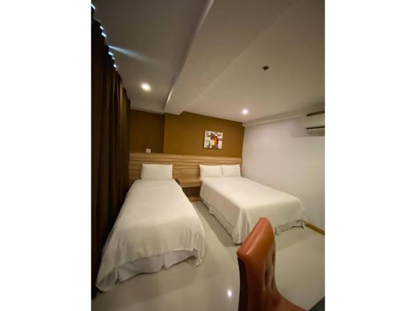 Vaccinated Staff - Capital O 820 Guijo Suites Makati