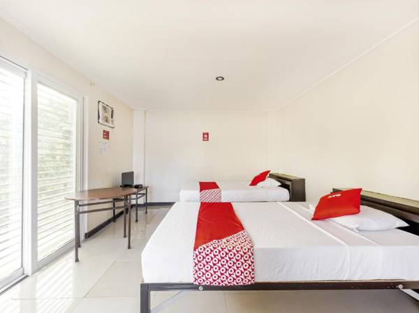 Vaccinated Staff - OYO 842 City Smiles Apartelle