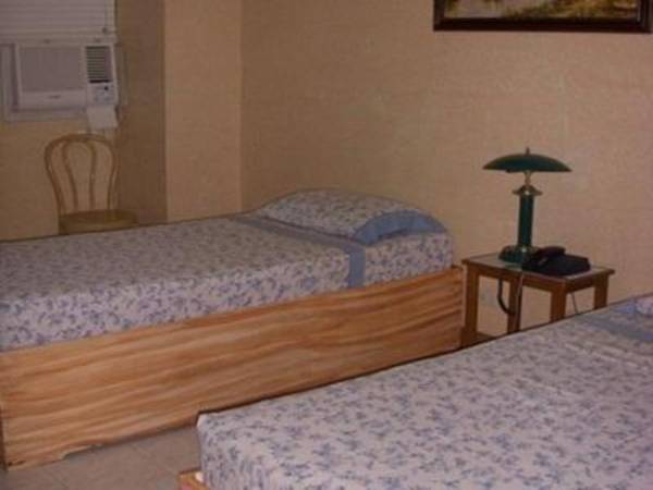 Plaza Maria Luisa Suites Inn