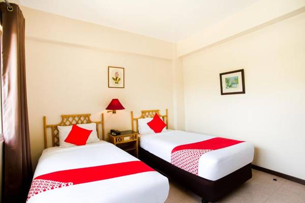 Vaccinated Staff - OYO 414 Humberto's Hotel