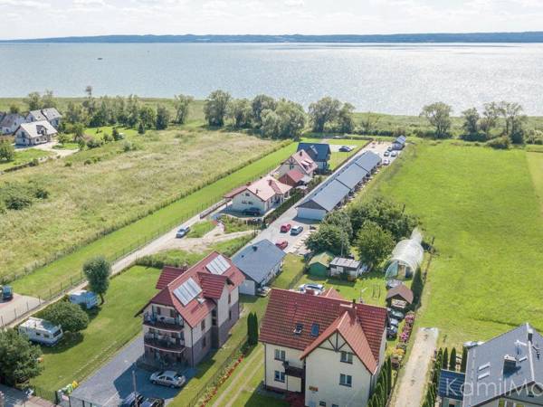 Comfortable apartment in a wooden cabin by the sea in Krynica Morska