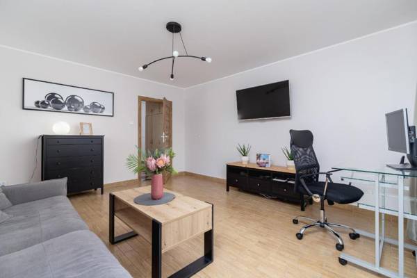 Workspace - Pleasant Apartment with Terrace Cracow by Renters