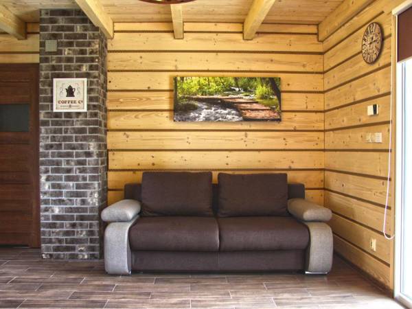 A wooden eco-friendly house by the Goszcza lake. Living room 2 bedrooms.