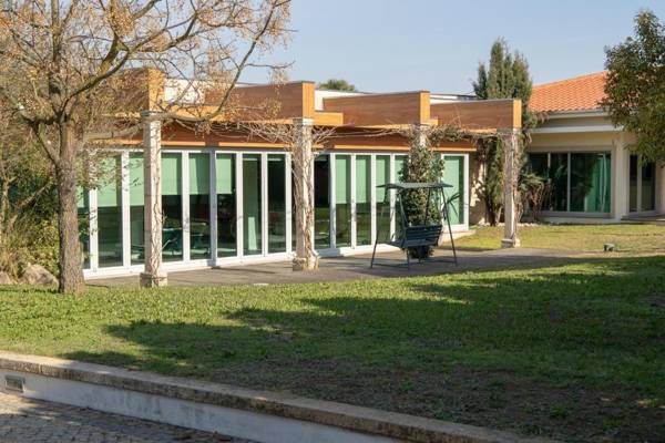 4 bedrooms villa with indoor pool jacuzzi and enclosed garden at Santo Tirso