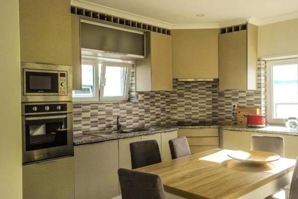 4 bedrooms house with shared pool enclosed garden and wifi at Atalaia 3 km away from the beach