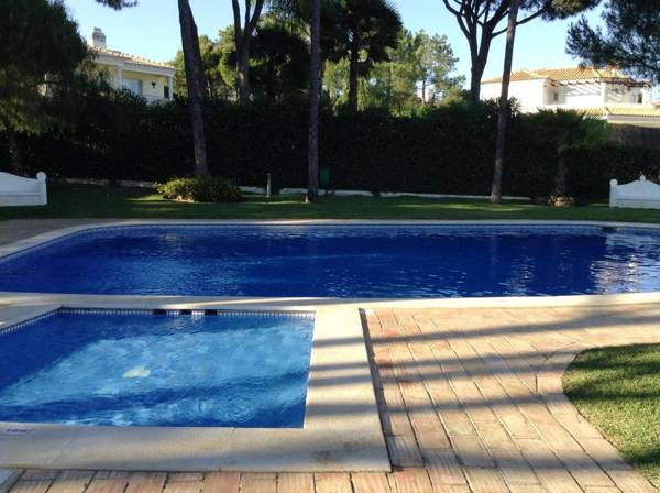 3 bedrooms house with shared pool enclosed garden and wifi at Vilamoura 3 km away from the beach