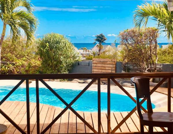 2mn à pieds plage Boucan Marina Appart Hotel & Villa