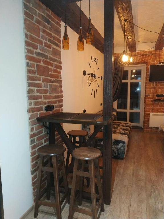 Loft апартаменти з балконом в центрі Львова