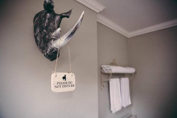 The Curious Pig in the Parlour