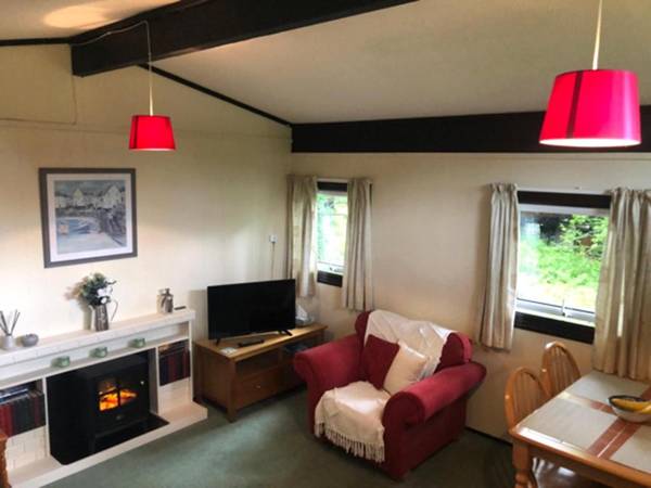 Nuthatch Lodge is set in 24 acres of woodparkland near the village of Cenarth