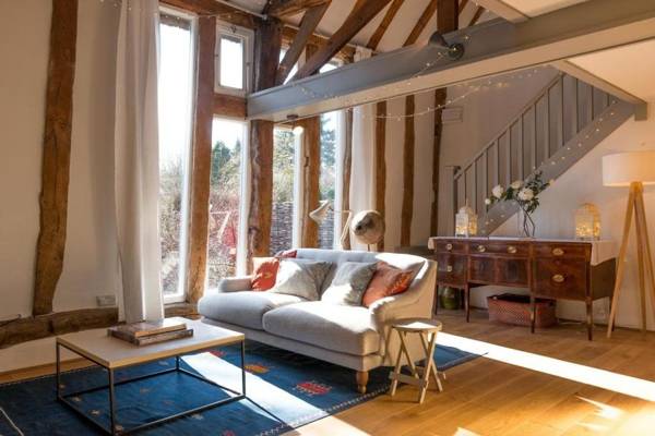 Deepwell Granary is a lovely thatched barn with attached meadow woodland