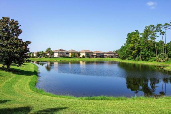 Palm Golf- 6 Bedroom Home with a south facing pool relaxing spa and game room in a gated resort