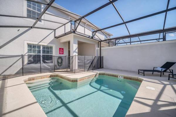 In the heart of Kissimmee Storey Lake Resort 4BD 3BA Pool Townhome 4SL4857