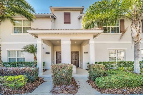 In the heart of Kissimmee Storey Lake Resort 4BD 3BA Pool Townhome 4SL4857