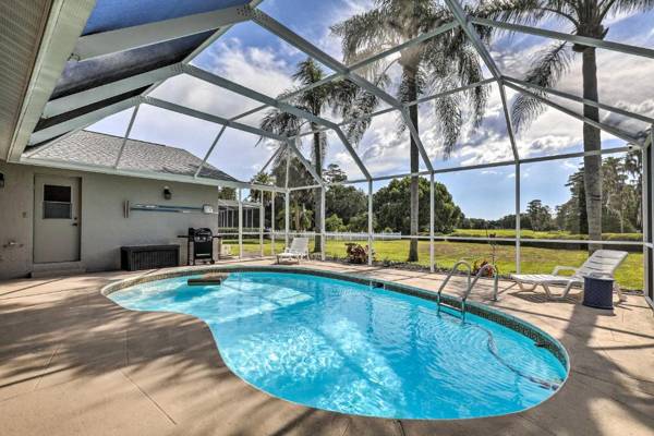 Palm Harbor Home with Pool and Golf Course Views!