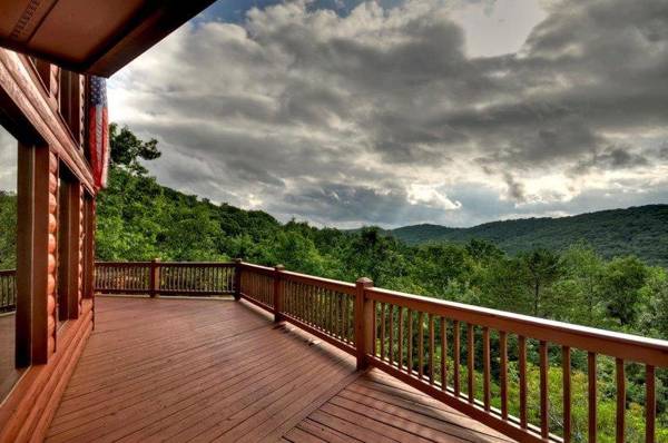 WILD THINGS enjoy the North Georgia Mountain View with this Wall of Windows!!!!