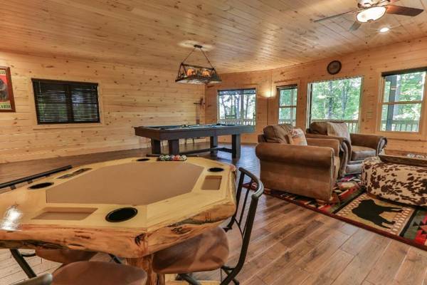 TAKE IT EASY in this Custom designed luxury log cabin is located in quiet area on paved road.