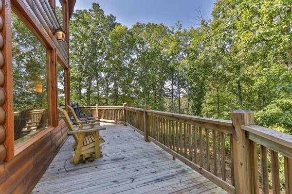 TAKE IT EASY in this Custom designed luxury log cabin is located in quiet area on paved road.